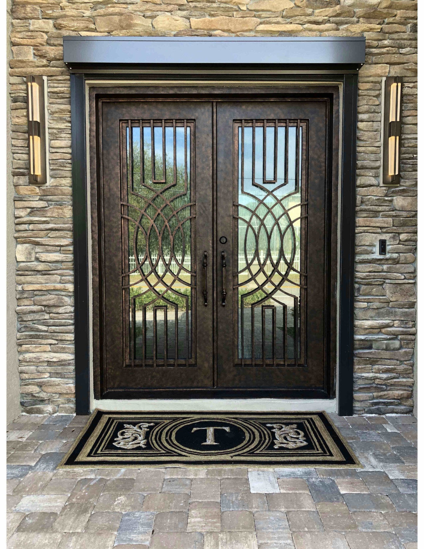 Premium Iron Doors with Bronze Monogram Accents