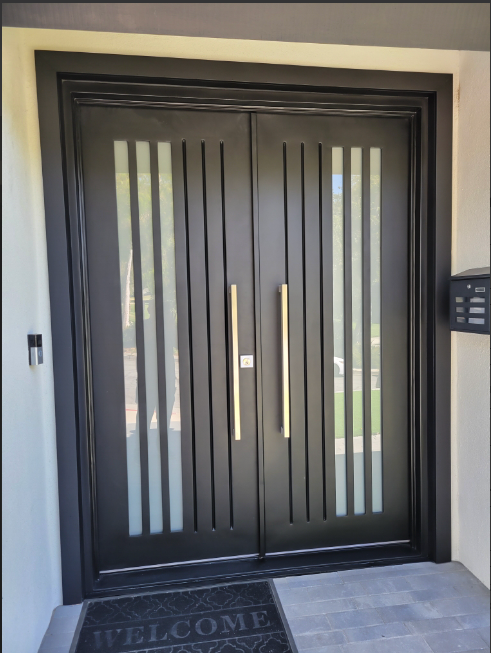 Security entrance door with vertical stripes