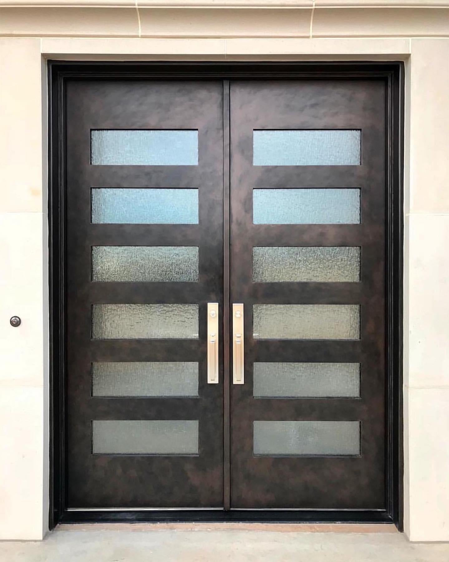 Elegant double iron entry doors with glass